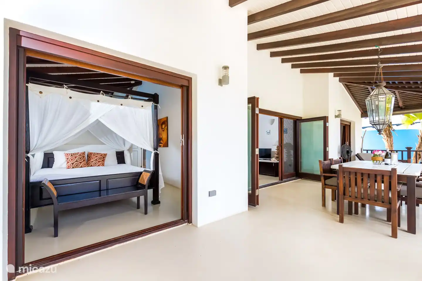 The first bedroom with patio doors to the terrace. In the morning a romantic breakfast in bed with a nice view