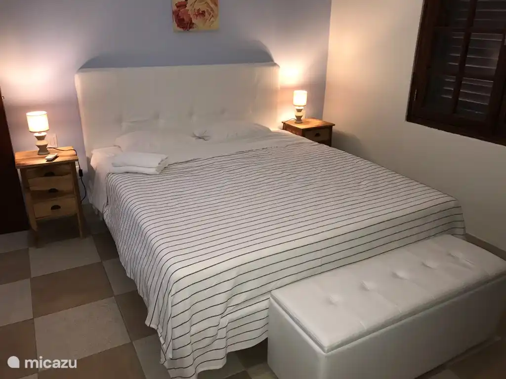 There are 2 of this kind of 2 bedroom with box spring beds and adjacent bathroom