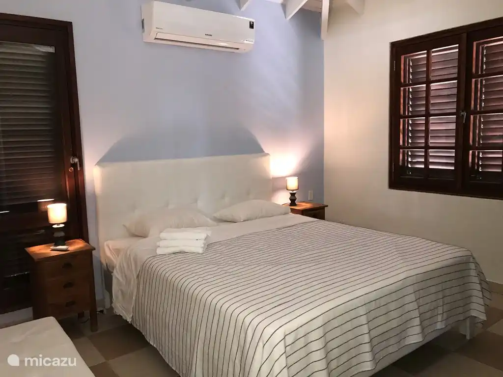 2 x spacious double bedrooms with box spring beds