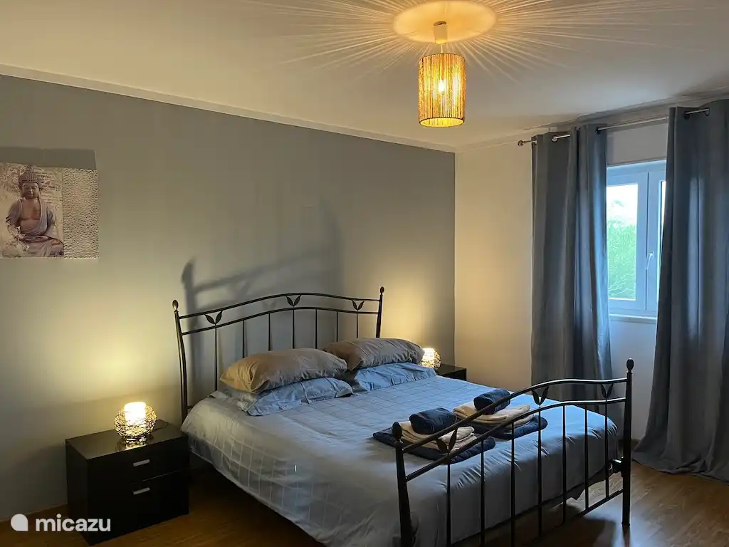 Spacious bedroom with double bed 160cm wide.