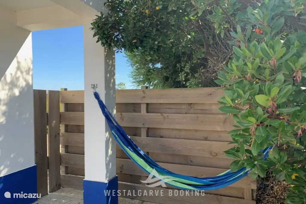 Terrace with good garden furniture and hammock.