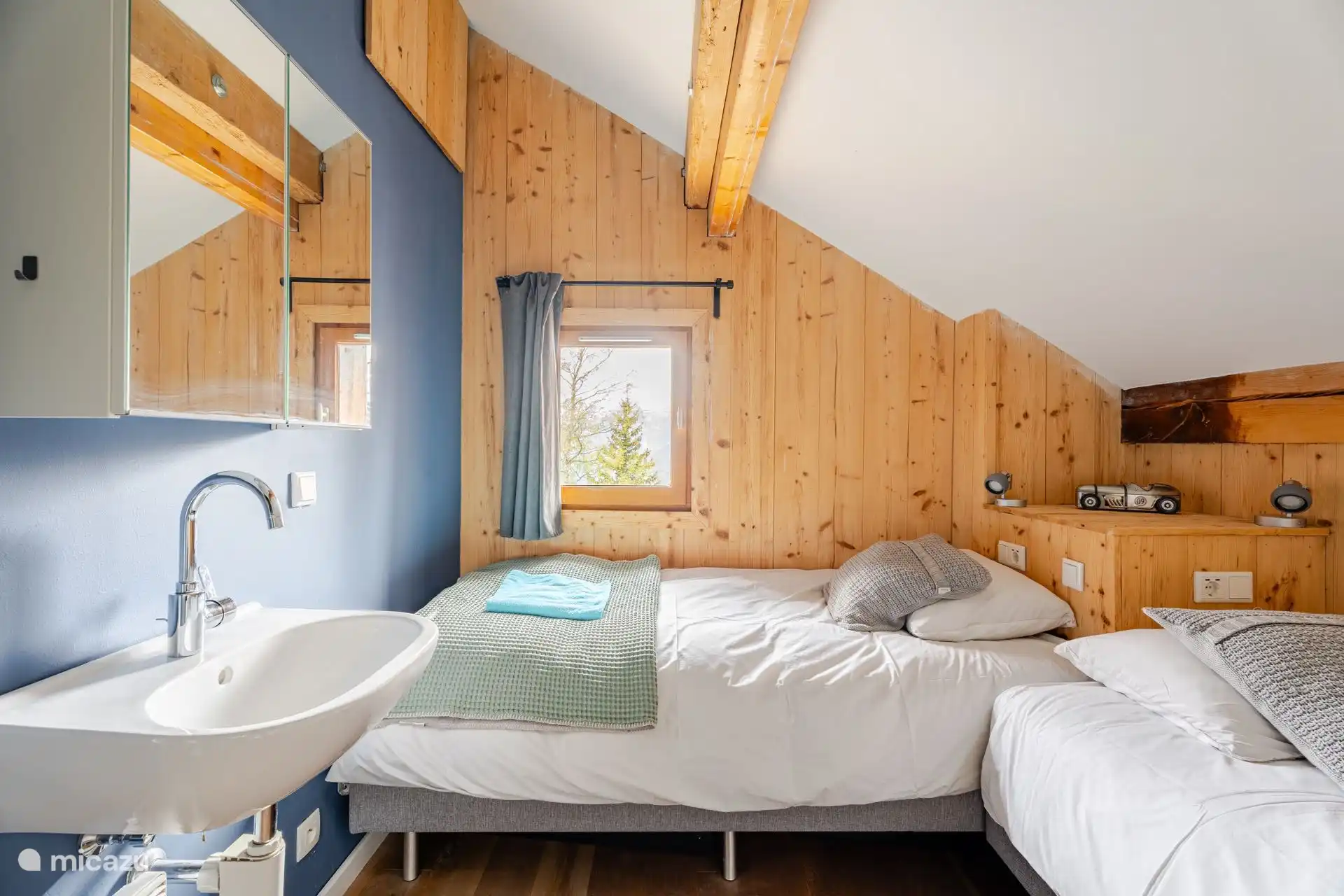 Bedroom 3 - two spacious single beds and a sink