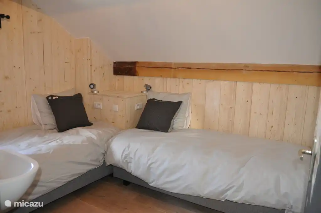 Bedroom 3 - two spacious single beds and a sink