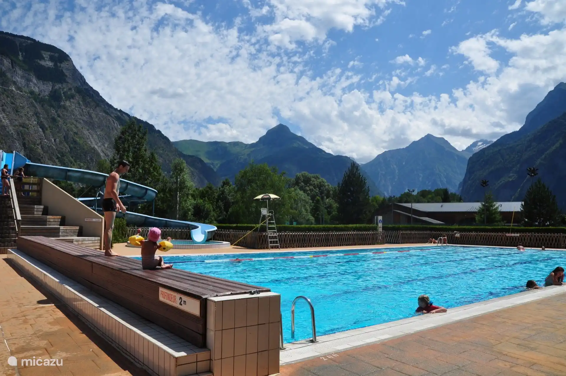 Down in the valley in Bourg d'Oisans is a nice swimming pool with slide