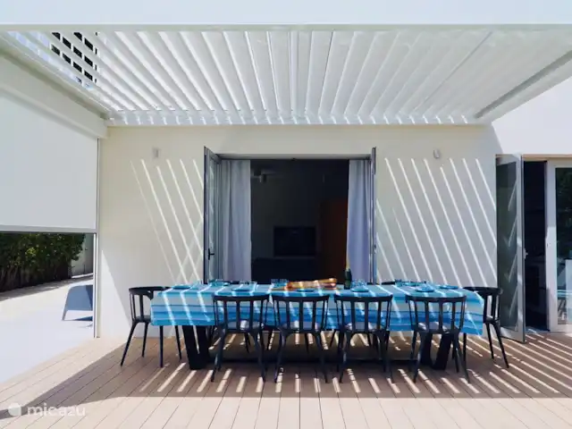 Villa by the sea, near Barcelona in Spain, Barcelona, Castelldefels - villa The pergola has an extra sunscreen on one side