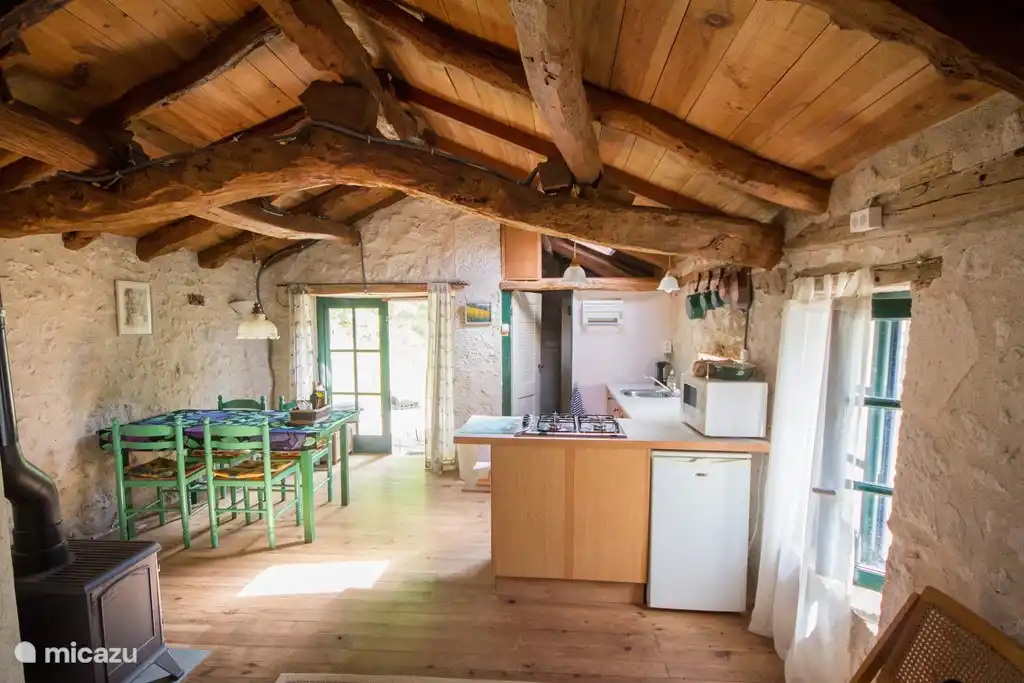 kitchen table, the left is the alcove with bunk beds