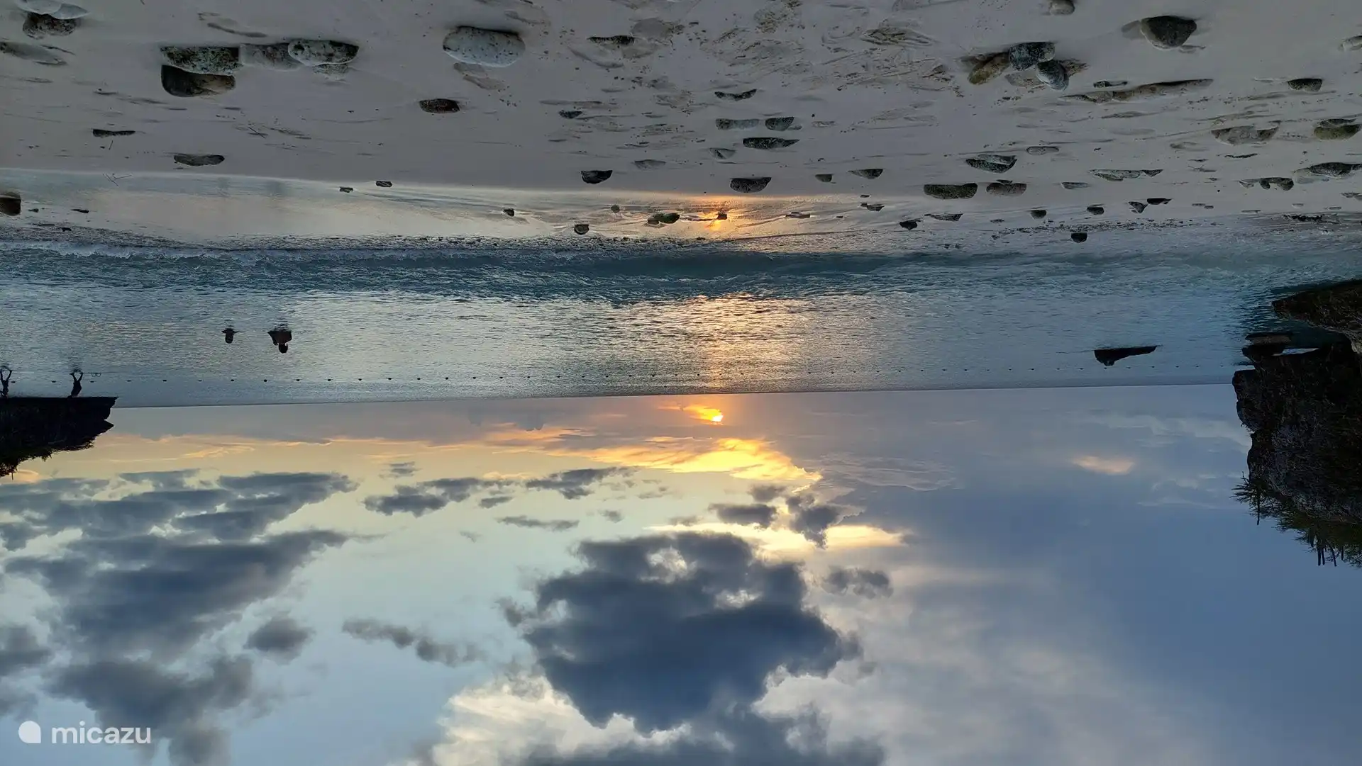 Plage Daiboo mit Sonnenuntergang