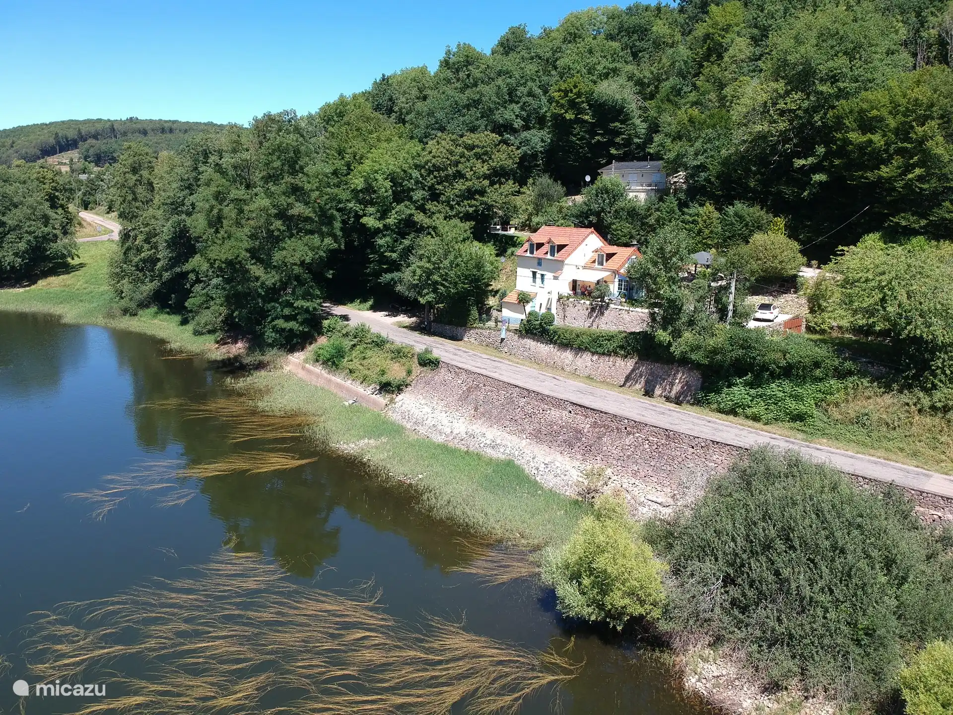 Lac de Panneciere mit unserem Haus auf der rechten Seite
