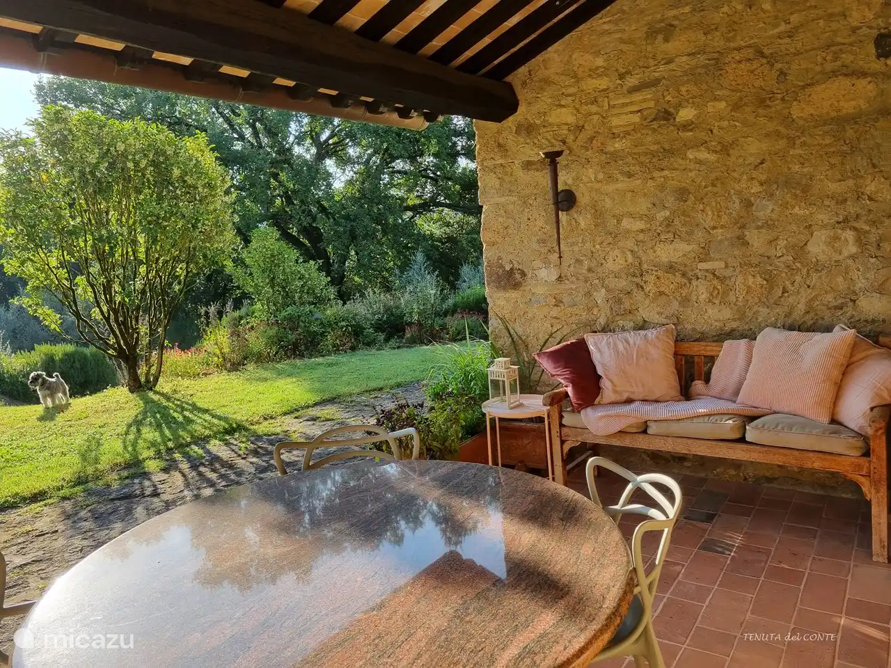 The covered terrace on the east side of the house. Great for breakfast.
