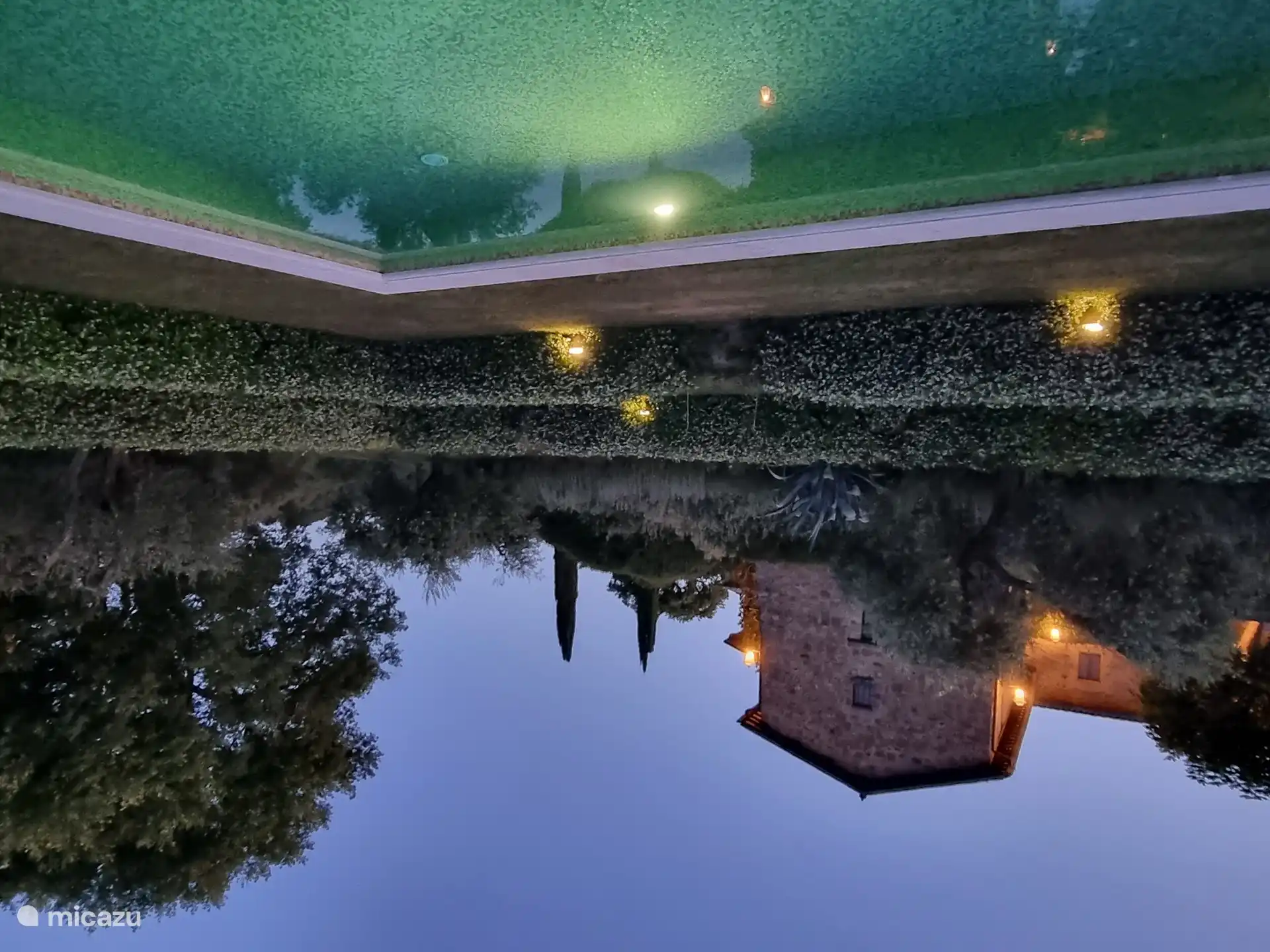 The swimming pool at the foot of the house
