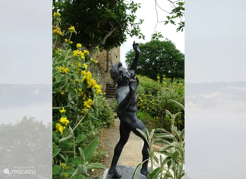Path under the terrace of the villa