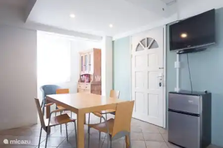 Vakantiehuis Aruba, Paradera, Paradera appartement La Felicidad - Appartement Ruby De keuken / woonkamer