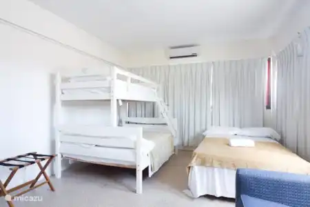 Vakantiehuis Aruba, Paradera, Paradera appartement La Felicidad - Appartement Ruby Slaapkamer 1