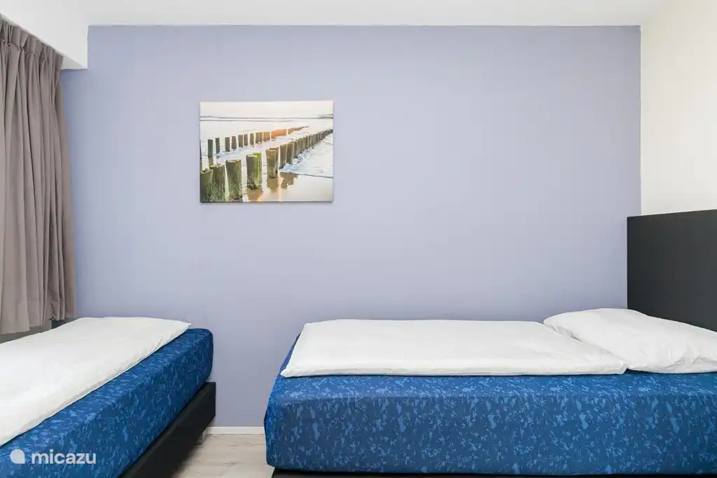 Chambre avec 2 sommiers confortables