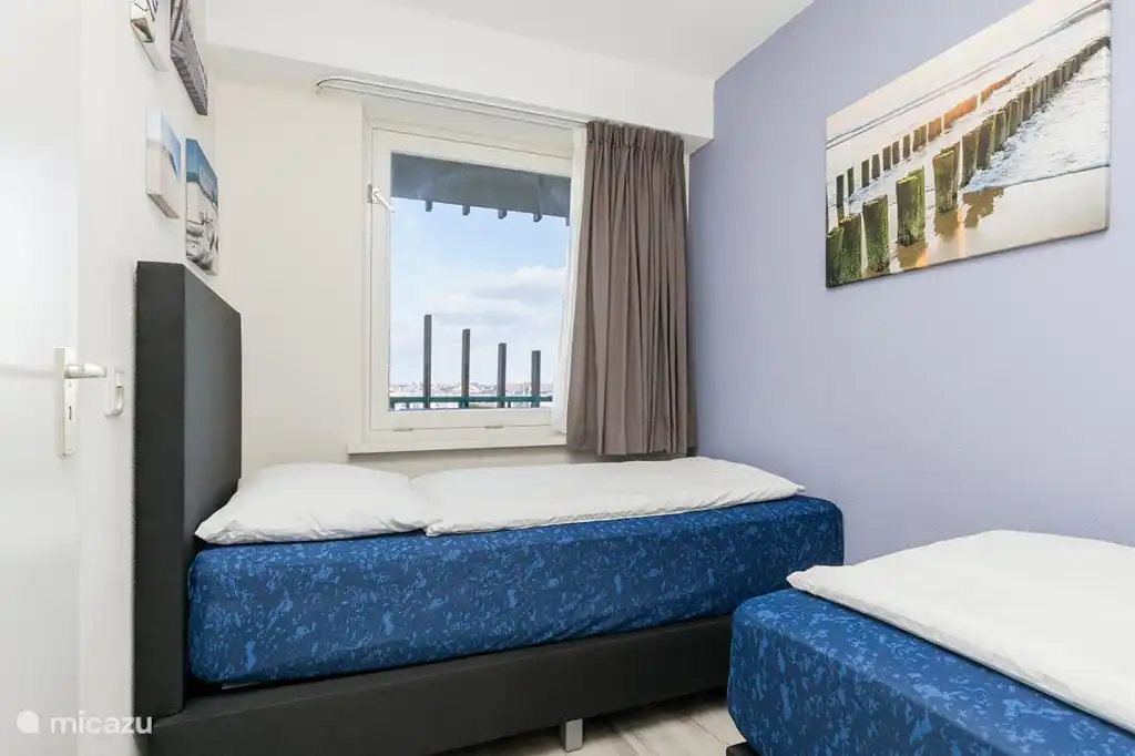 Chambre avec 2 sommiers confortables