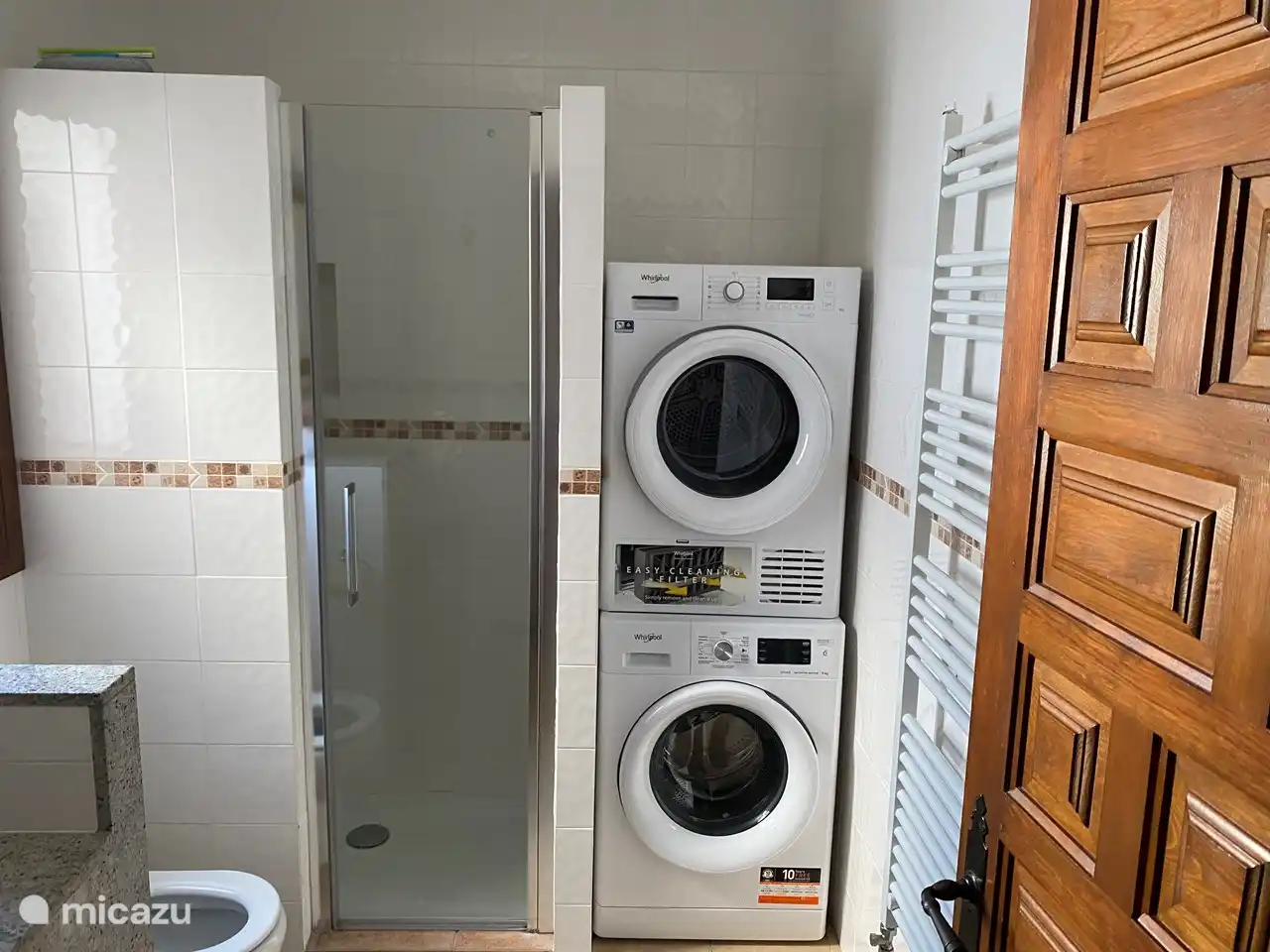The bathroom downstairs next to the 2nd and 3rd bedroom. 
