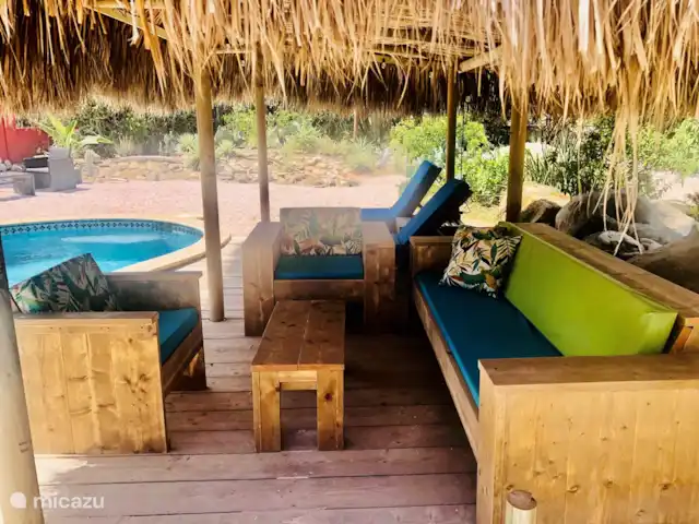 Casa Alto Vista | Aruba, Nord, Alto Vista - maison de vacances Joli coin salon à l'ombre avec 2 bains de soleil