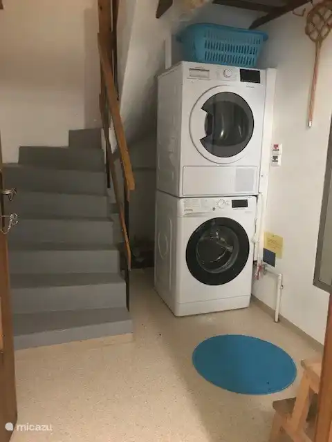 Stairwell with laundry room
