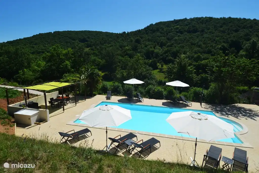 Swimming pool with a view of the green hills