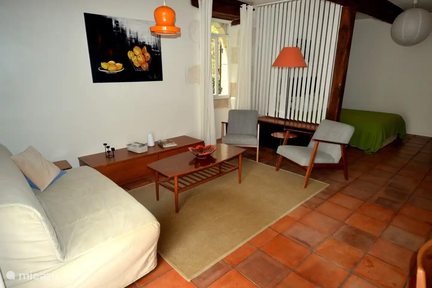 Cottage with open kitchen, dining room, sitting area and sleeping area