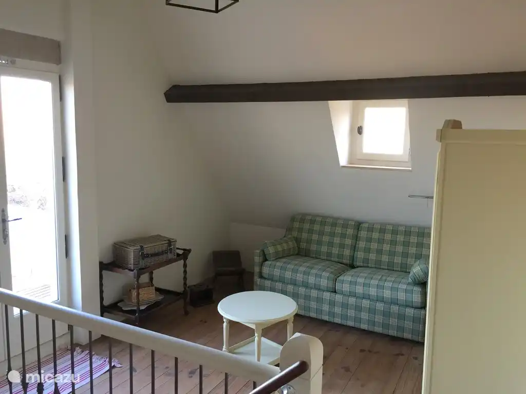 slaapbank op de verdieping bij het dakterras