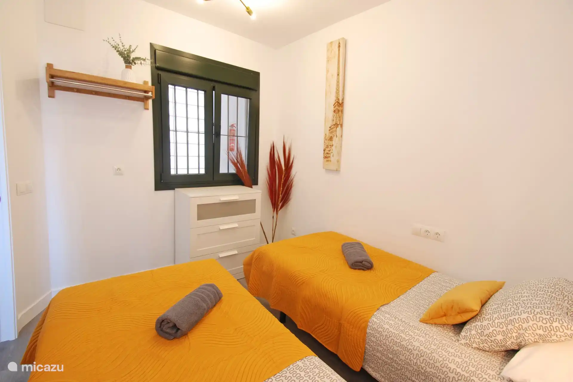 Zimmer mit 2 Doppelbetten.