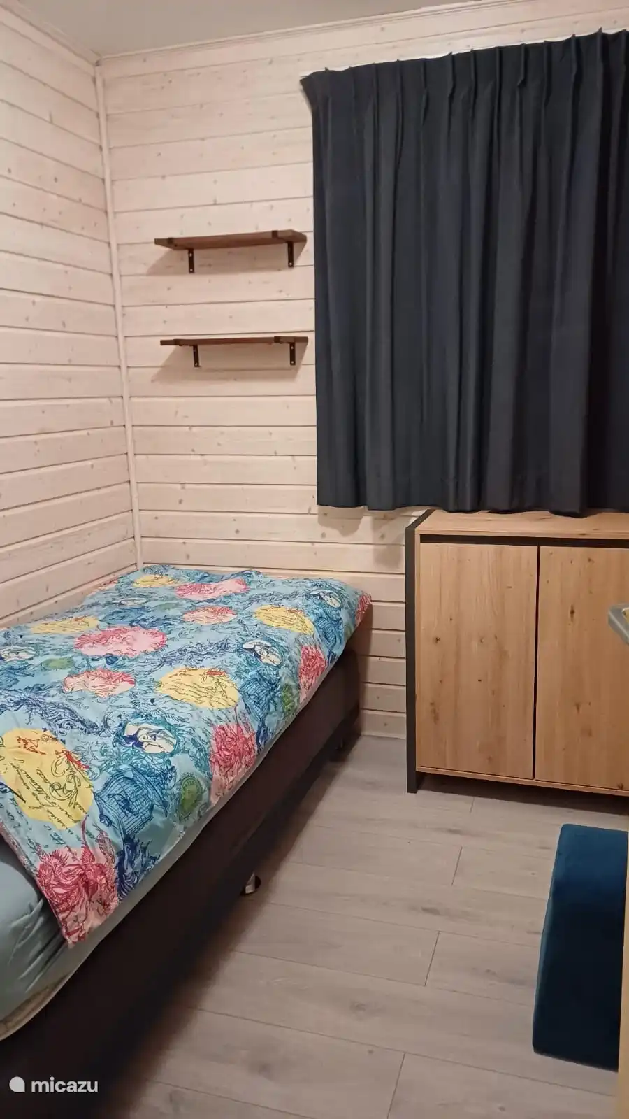 De derde slaapkamer met boxspring