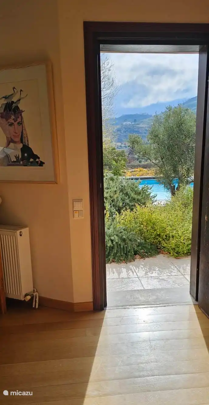 The front door of the apartment overlooking the pool.