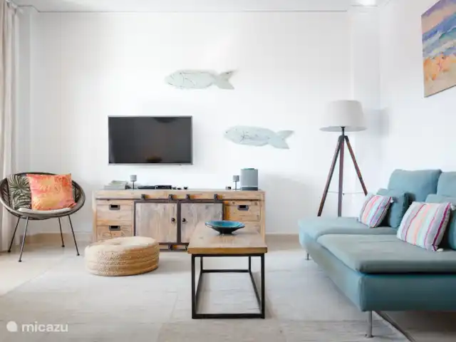 Apartamento Benvinguts en España, Costa Blanca, Jávea - apartamento El salón ofrece amplios asientos y un televisor con canales holandeses.