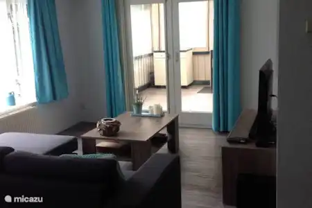 Vakantiehuis Nederland, Gelderland, Putten chalet Roos Huiskamer met zicht op veranda
