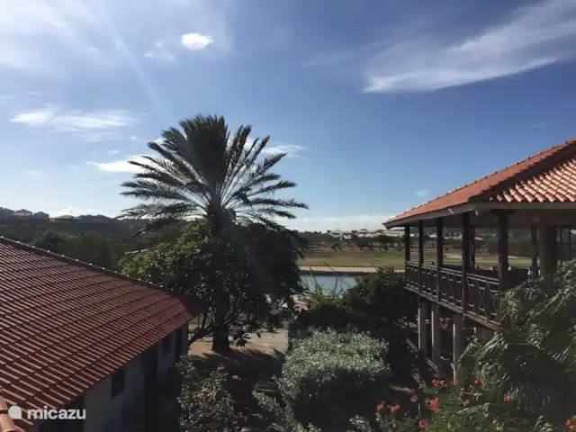 Villa XXL sur la plage de Blue Bay | Curaçao, Curaçao-Centre, Blue Bay - villa De la véranda de la Villa 5, vous pouvez voir le lac Flamingo !