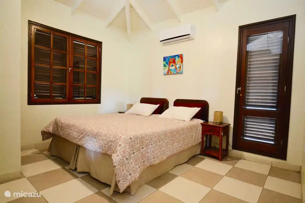 Bedroom 1 has an inverter air conditioning and ceiling fan!