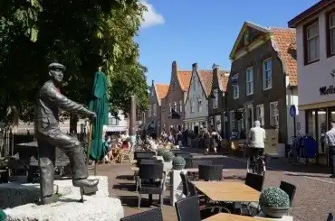 cozy center Ouddorp by the sea with terraces and shops