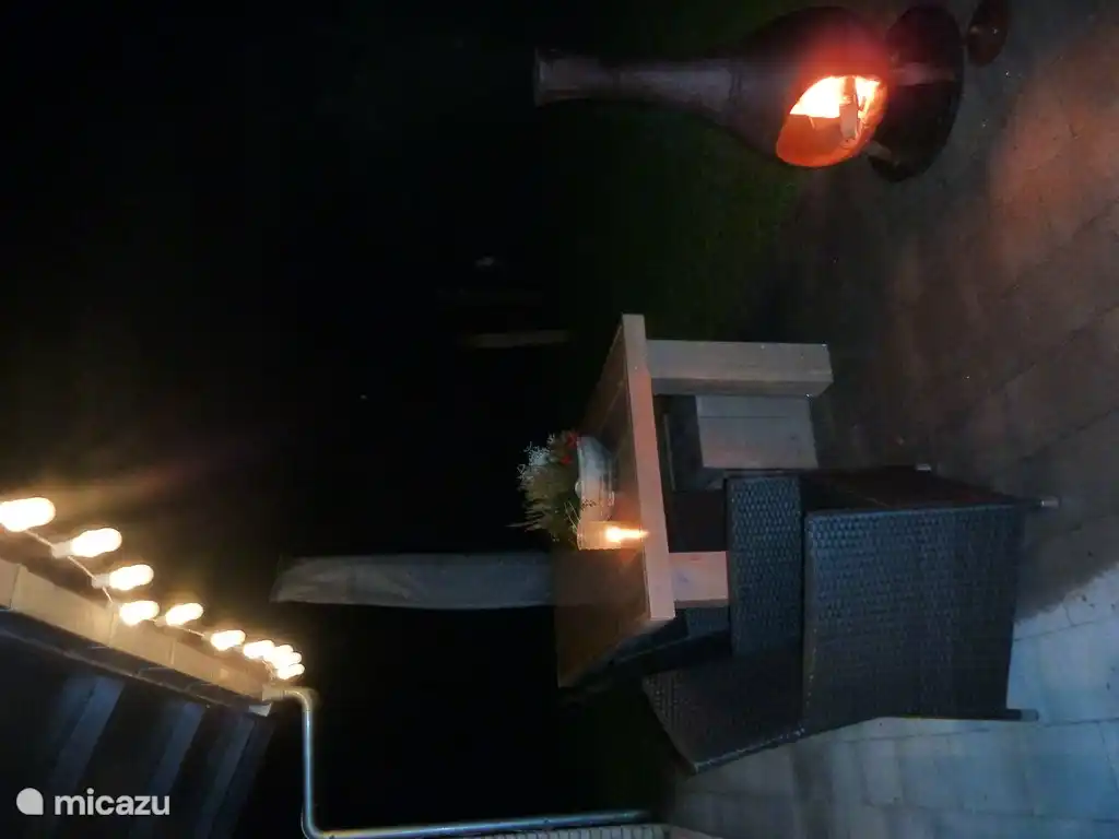 cozy sitting by the stove outside .. summer and winters very nice ..