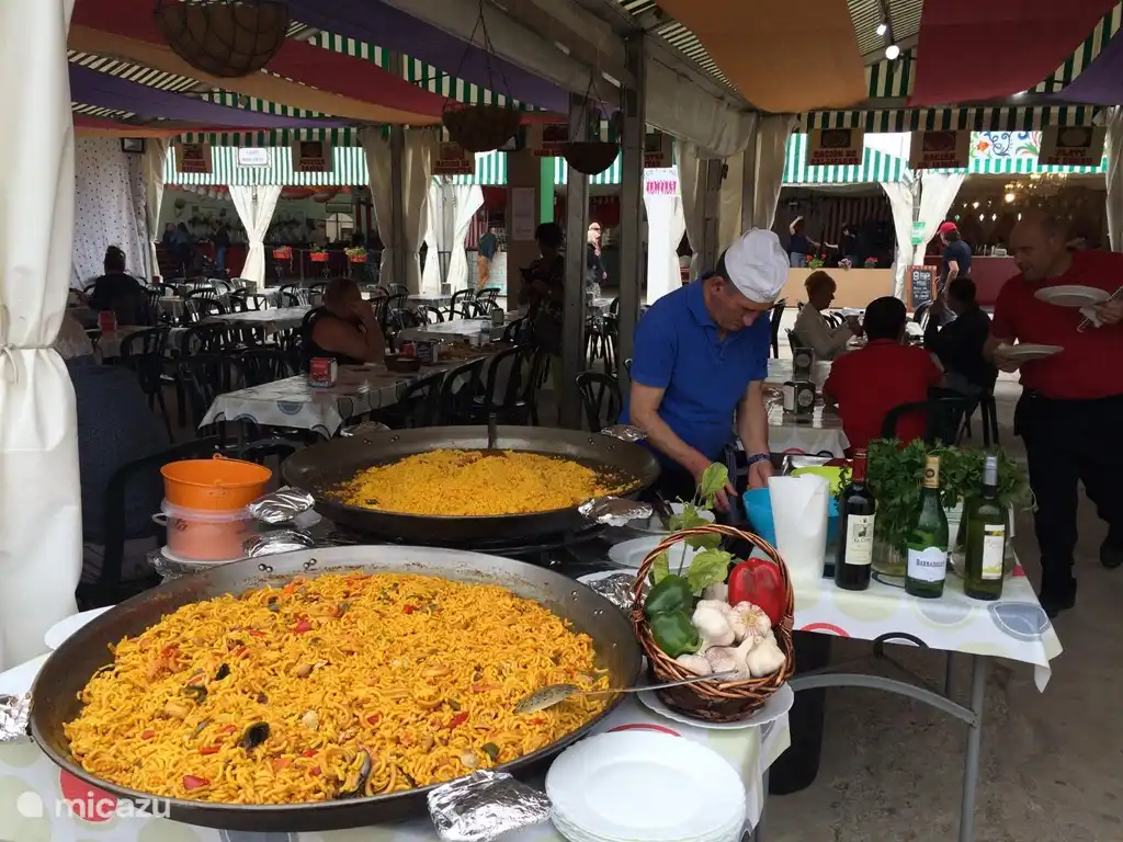 Paella eat at the local market.