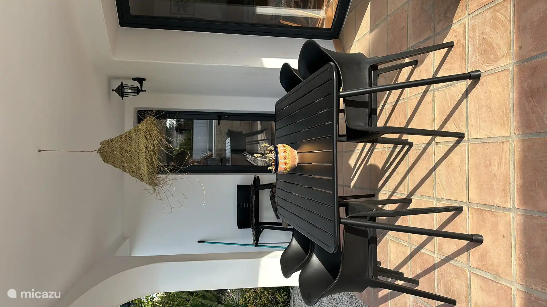 Garden set (under veranda) and lounge set next to the house