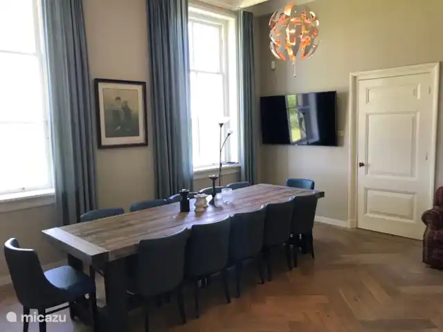Tussen Ysselt, ferme de 14 personnes | Pays-Bas, Gueldre, Hoog-Keppel - maison de vacances Salle à manger avec poêle à bois.