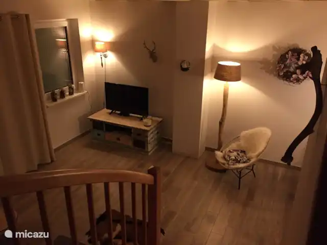 Berghaus Christel en Austria, Carintia, Arnoldstein - casa vacacional TV en atractiva sala de estar. La chimenea ya está instalada (todavía no estaba allí cuando se tomó la foto)