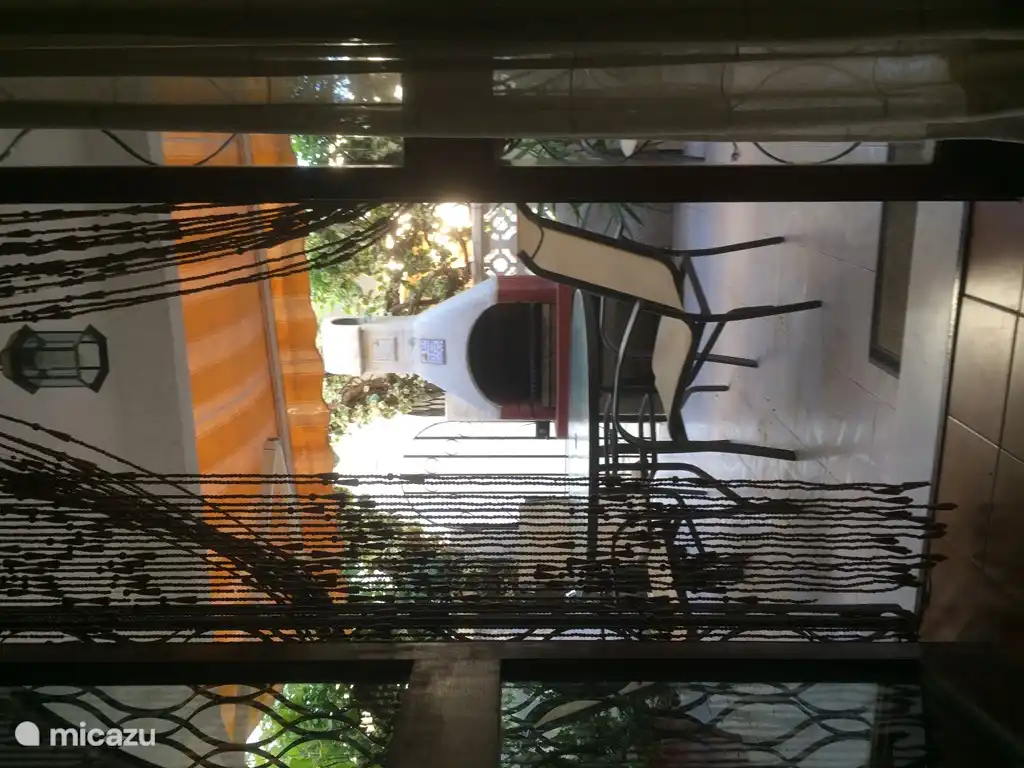 Portes ouvertes du salon à la terrasse extérieure