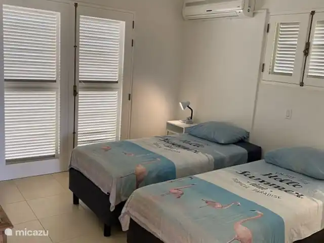 villa huren in Bonaire, Bonaire, Belnem – Luxe villa aan zee 'Op de Maze' Appartement slaapkamer 1