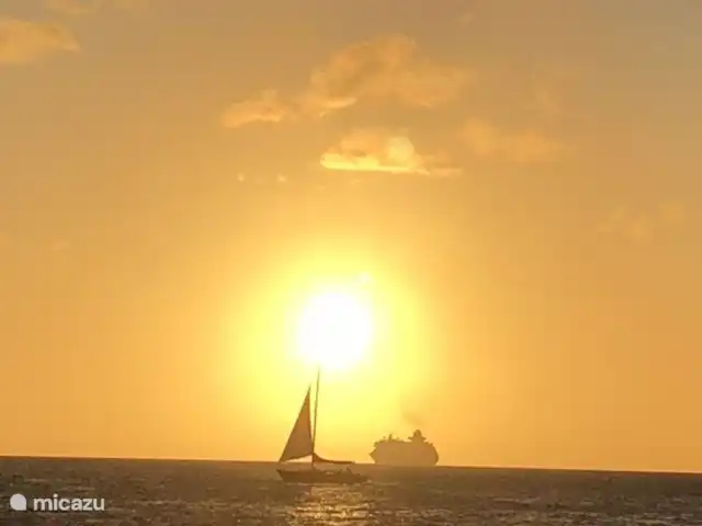 villa huren in Bonaire, Bonaire, Belnem – Luxe villa aan zee 'Op de Maze' Zonsondergang vanaf het terras