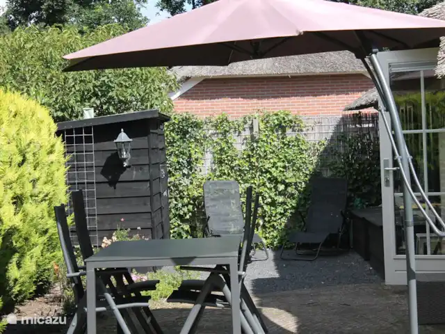 Parc Veluwerijck 20, Veluwsboerderij huren in Nederland, Gelderland, Ermelo - vakantiehuis Een van de zithoeken in de tuin