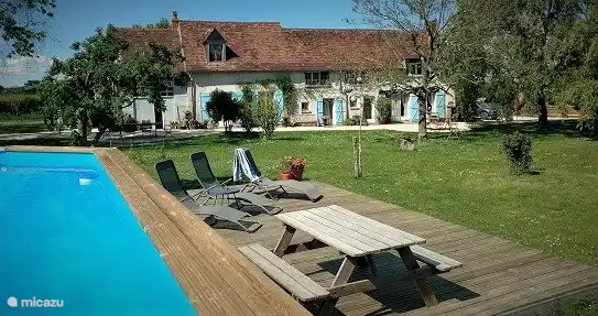 Enjoy the summer in the pool or in the lazy chairs.