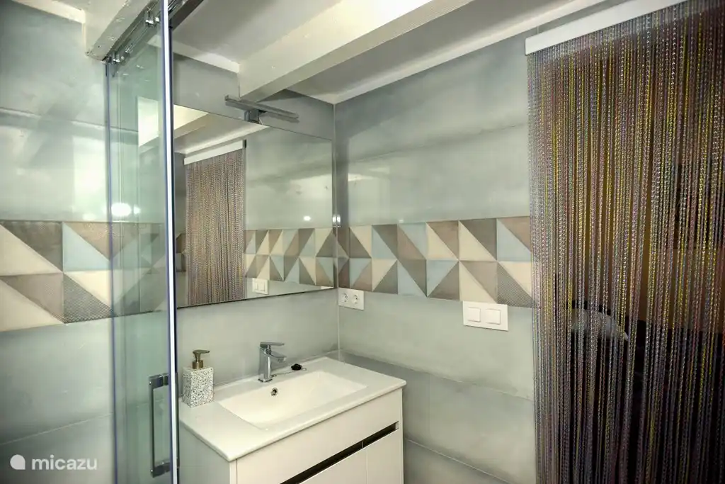 Badezimmer des Gästehauses mit Waschbecken