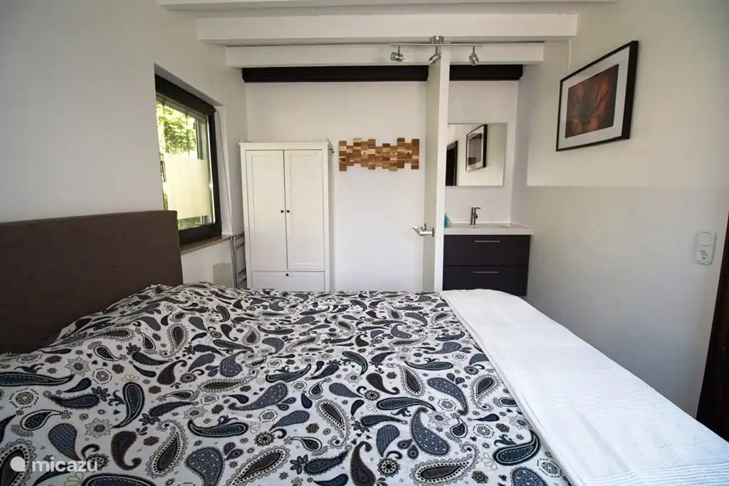 Schlafzimmer 1 mit 2 boxspring (2-mal 90x200) im Erdgeschoss.