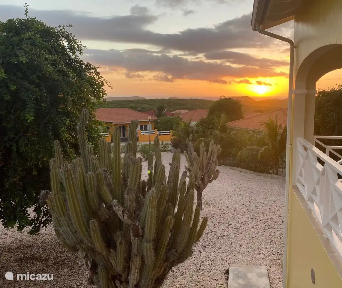 Watching the sun sink into the sea from holiday home La Villa Fontein