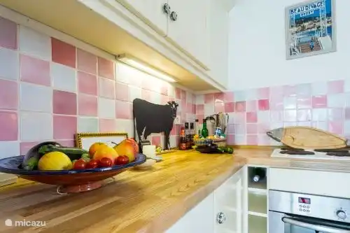 Kitchen with built-in appliances washing machine, dishwasher, oven, microwave, coffee machine