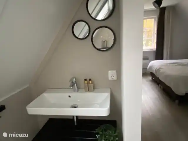 Location de Vacances Pays-Bas, Gueldre, Lievelde, maison de vacances - NatuurlijkLievelde En plus des 2 chambres, il y a une buanderie séparée à l’étage supérieur.
