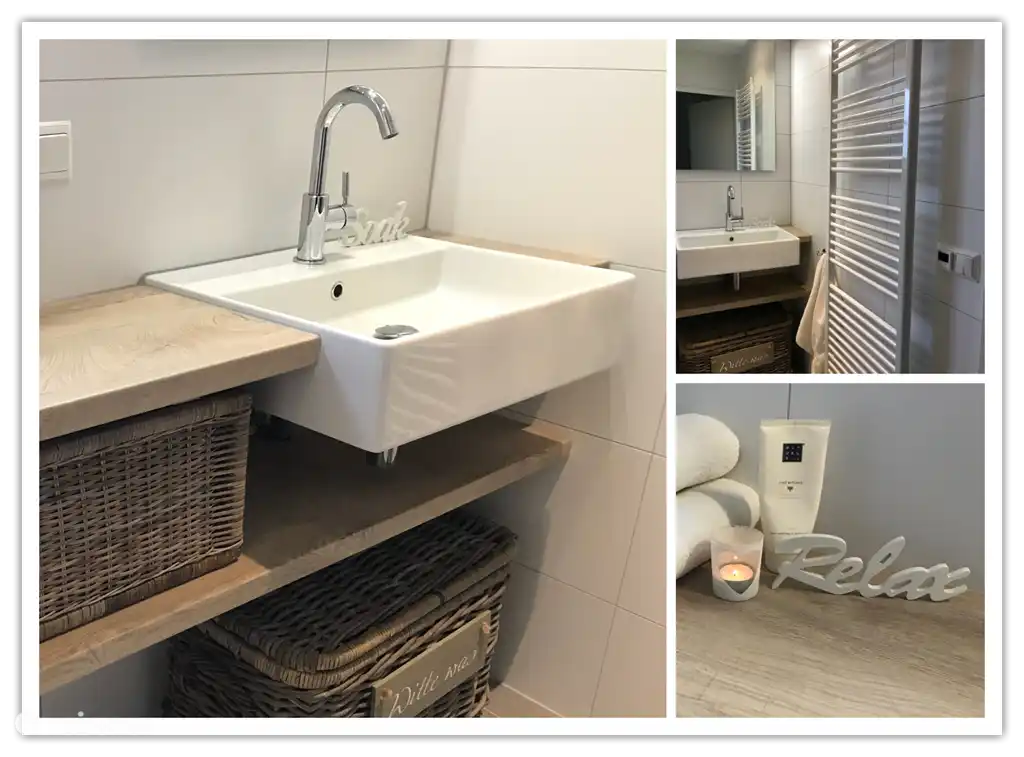 Das komfortable Badezimmer im Erdgeschoss verfügt über Fußbodenheizung und Spiegelheizung.