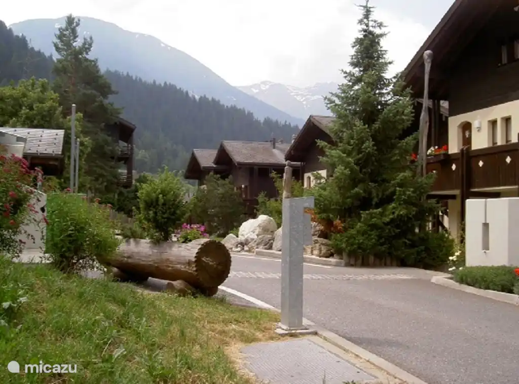 Back and entrance parking garage with own place.